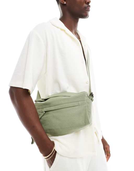 ASOS DESIGN soft cotton cross body bag with front zip pocket in sage green ASOS
