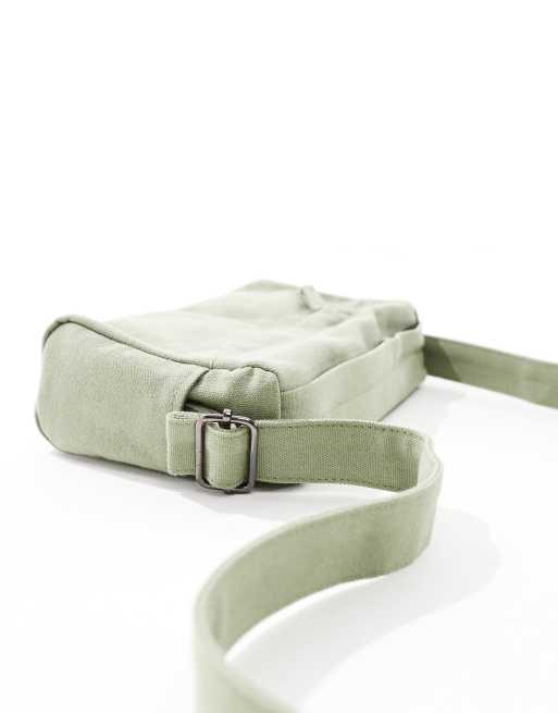 ASOS DESIGN soft cotton cross body with front zip pocket in sage green, 4 of 4