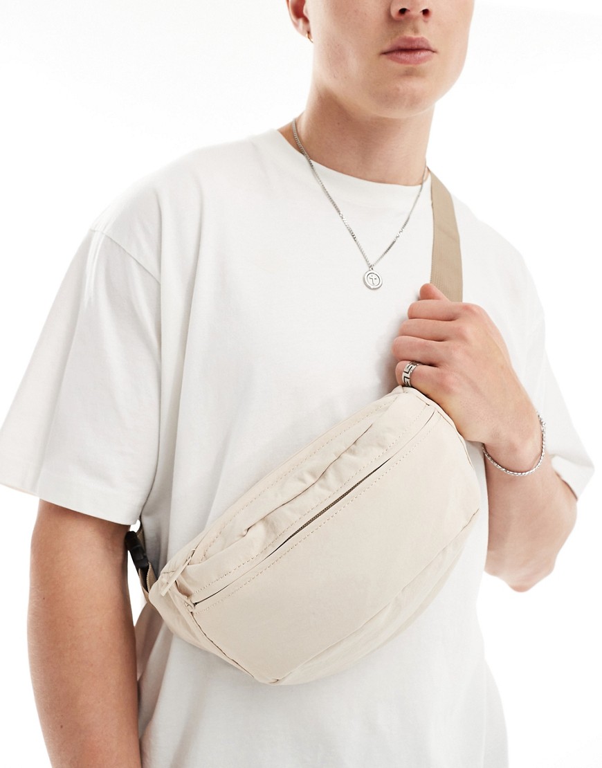 Shop Asos Design Soft Cross Body Fanny Pack With Multiple Compartments In Ecru And Stone-white