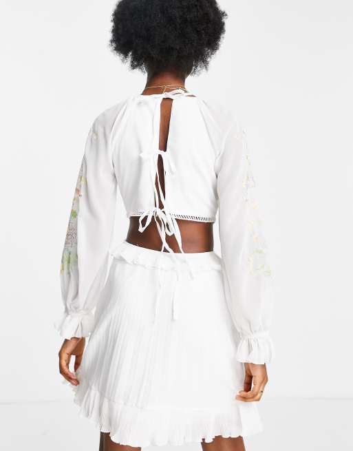 ASOS DESIGN soft cut out side pleated mini dress with embroidery in white |  ASOS