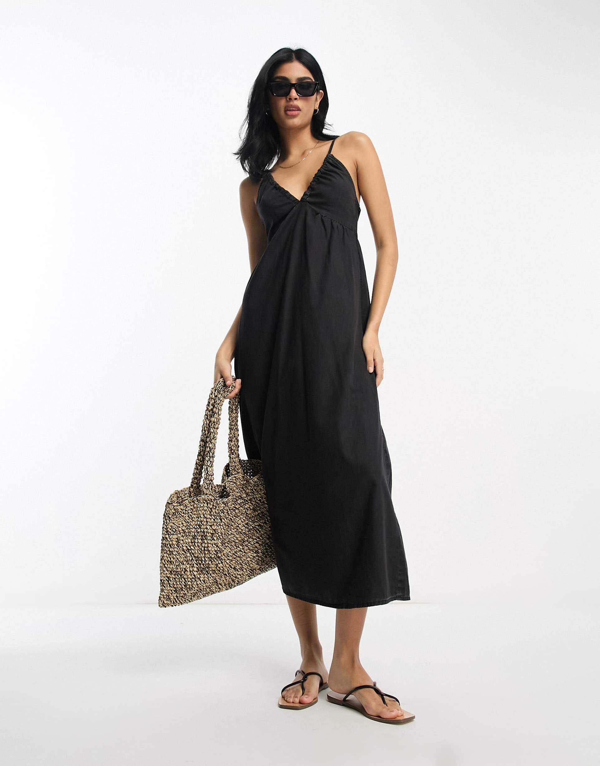 asos design soft denim maxi dress with strap back detail in washed black