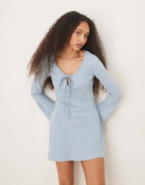 ASOS DESIGN soft denim mini dress with bow front detail in light blue - view 1
