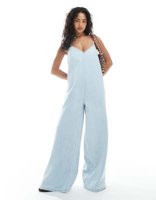 ASOS DESIGN soft denim scoop neck wide leg jumpsuit in mid wash blue - view 1