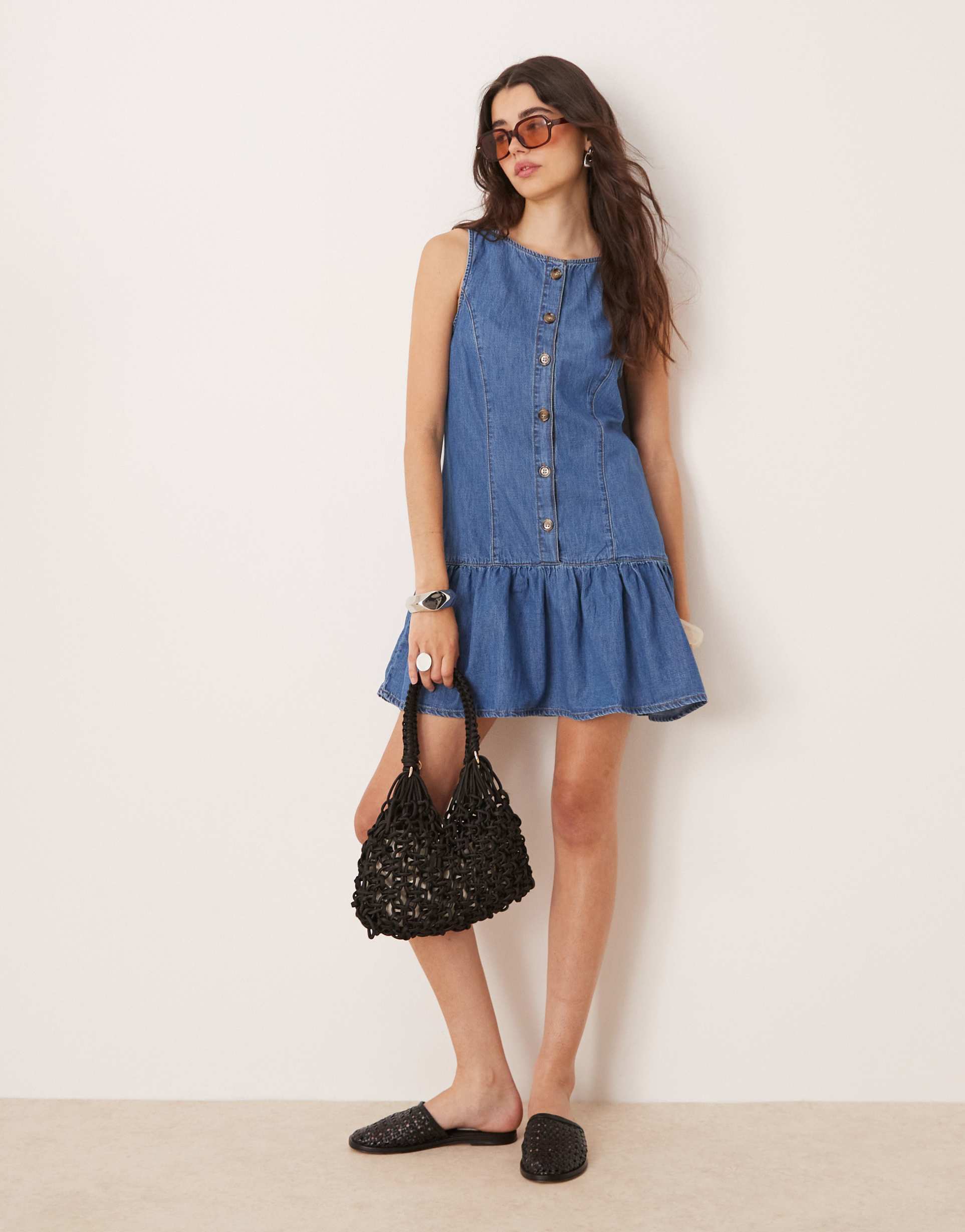 asos design soft denim sleeveless mini dress with dropped waist in mid wash blue