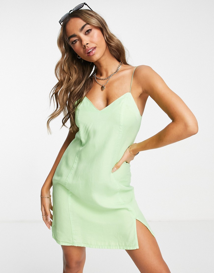 ASOS DESIGN soft denim strappy slip dress in green-Pink