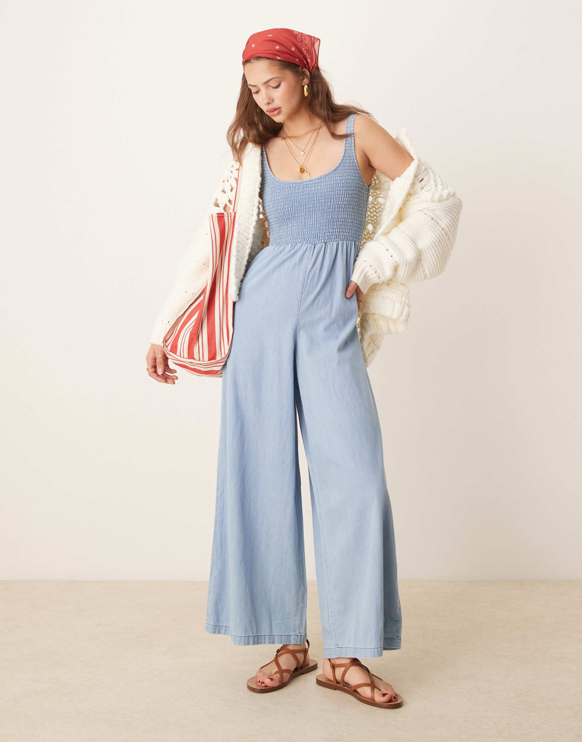 asos design soft denim wide leg jumpsuit with shirred body in light wash