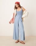 [ASOS DESIGN] ASOS DESIGN soft denim wide leg jumpsuit with shirred body in midwash blue 10 Mid wash blue