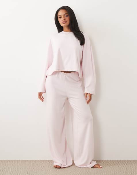 ASOS DESIGN soft jersey wide leg pajama pants with floral trim in soft pink - view 1