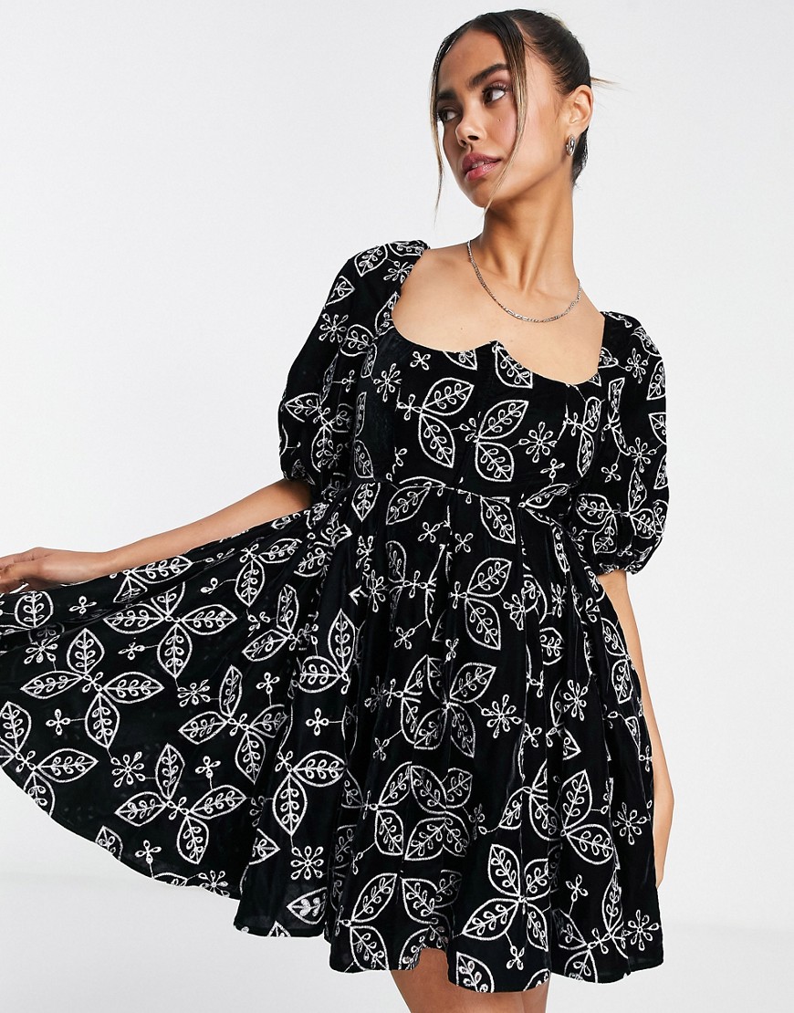 ASOS DESIGN soft mini dress in velvet broderie with contrast embroidery in black