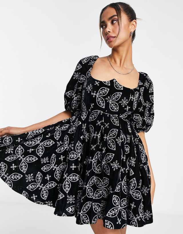 ASOS DESIGN soft mini dress in velvet eyelet with contrast embroidery in black