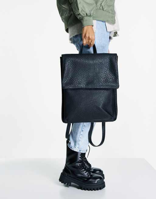 asos leather backpack with pointed flap ASOS DESIGN soft minimal backpack with flap detail in grainy pu