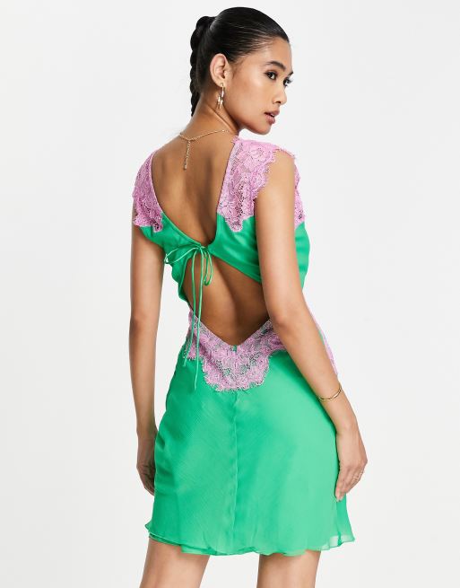 ASOS DESIGN soft slip mini dress with contrast lace and tie back detail in  green and pink | ASOS
