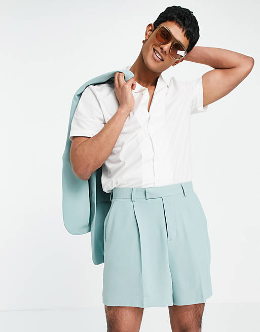 ASOS DESIGN soft tailored pleated wide leg bermuda suit shorts in pastel green crepe