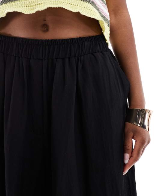 ASOS DESIGN soft textured oversized billow pants with tie hem in black