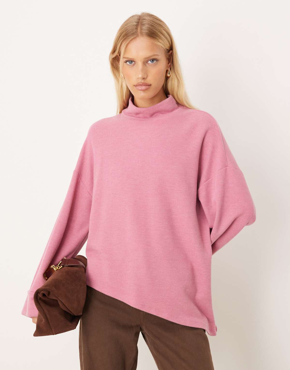 ASOS DESIGN soft touch asymmetric jumper with turn back cuff in pink