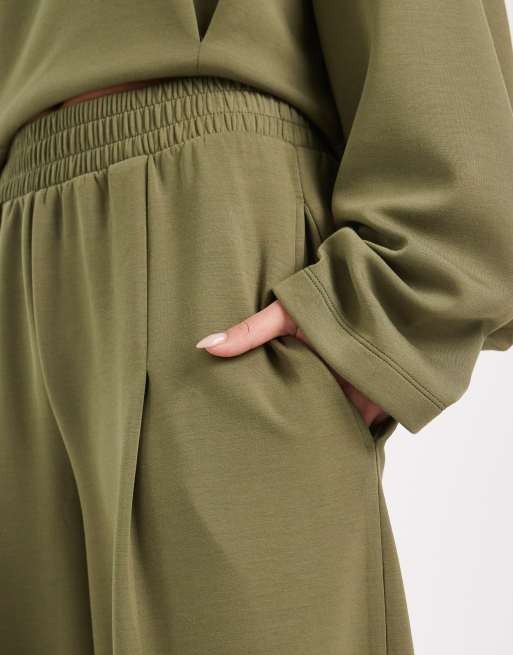 ASOS DESIGN soft touch cupro barrel leg trackies with seam details in khaki, 3 of 5
