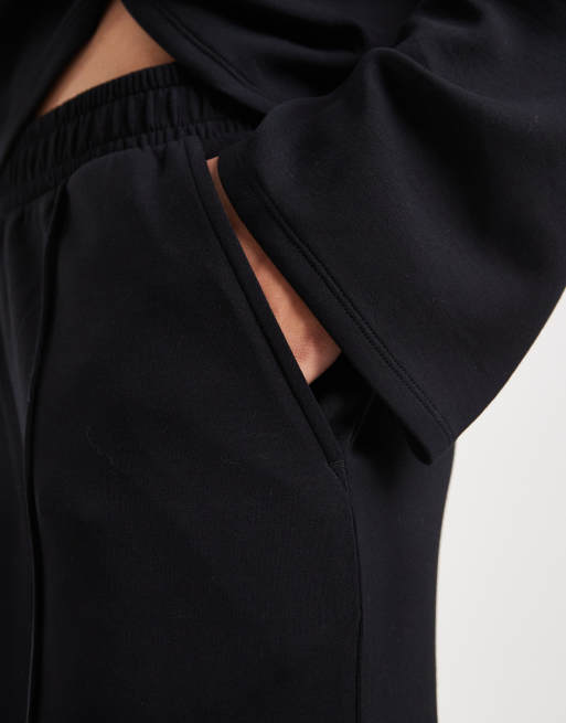 ASOS DESIGN soft touch cupro wide leg jogger in black, 4 of 5