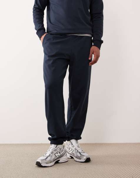 ASOS DESIGN soft touch oversized sweatpants in navy - part of a set - view 1