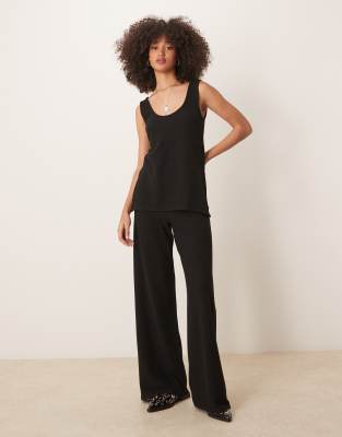Shop Asos Design Soft Touch Wide Leg Pants In Black