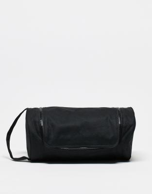 ASOS DESIGN soft wash bag with barrel design in black