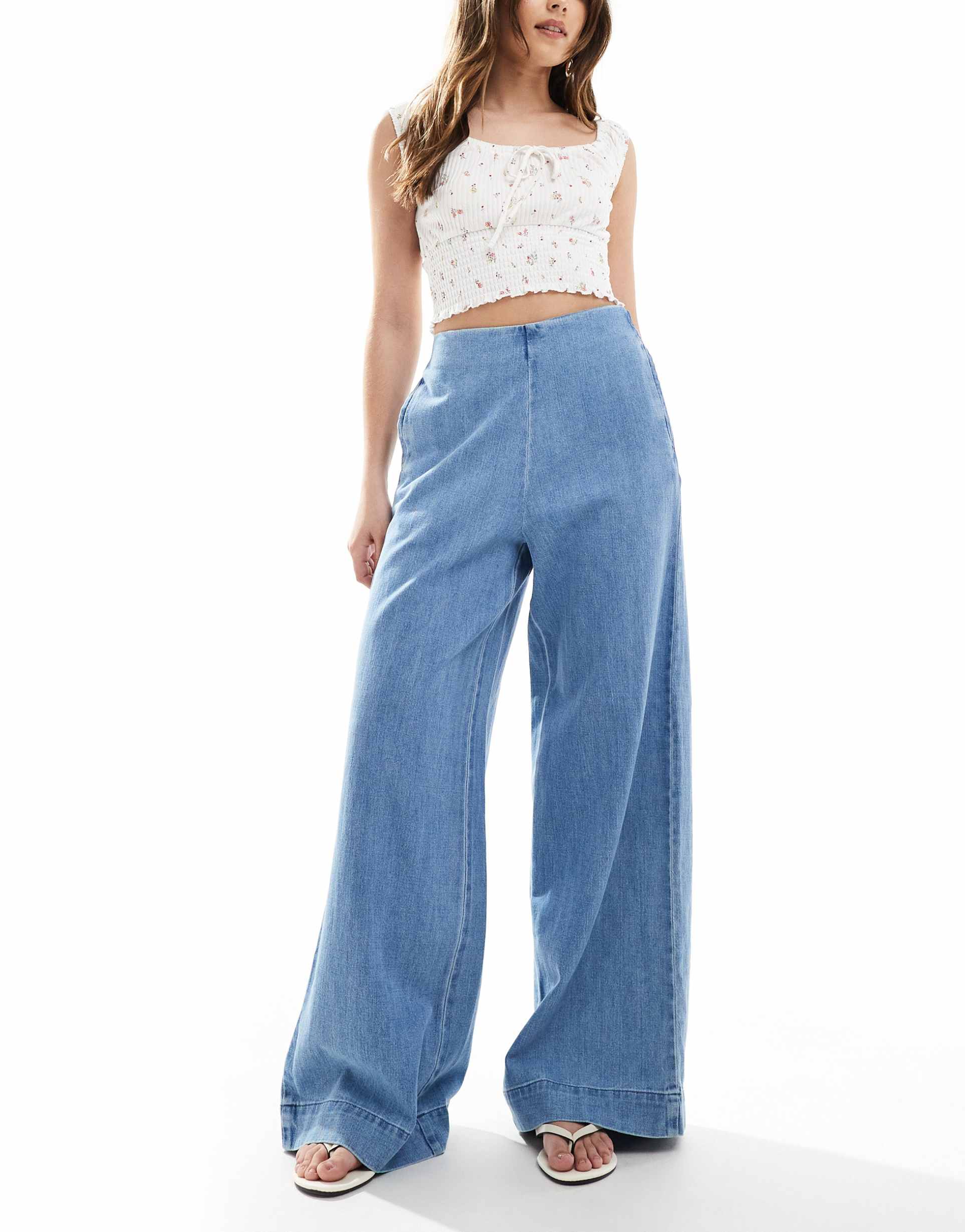 asos design soft wide leg jeans with clean front in midwash blue