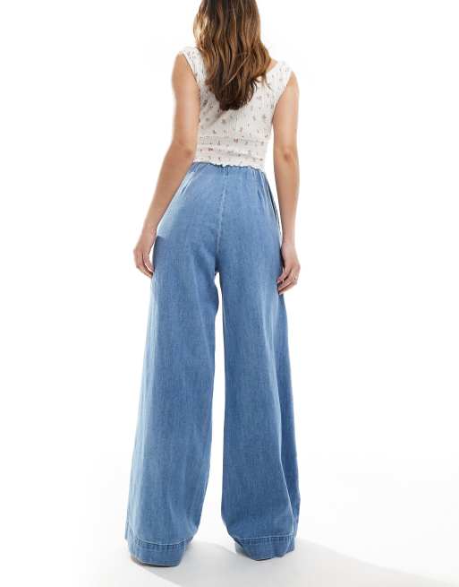 ASOS DESIGN soft wide leg jeans with clean front in midwash blue