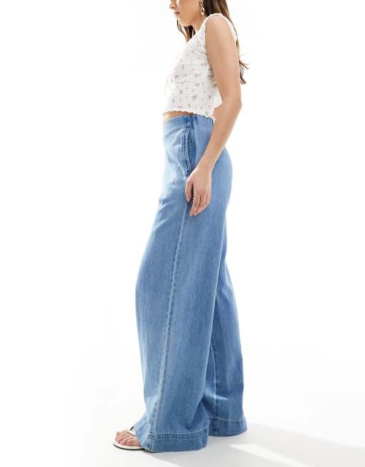 ASOS DESIGN soft wide leg jeans with clean front in midwash blue