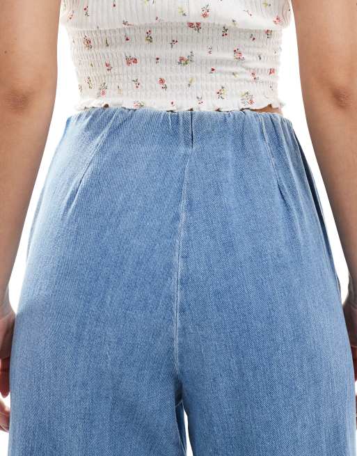 ASOS DESIGN soft wide leg jeans with clean front in midwash blue