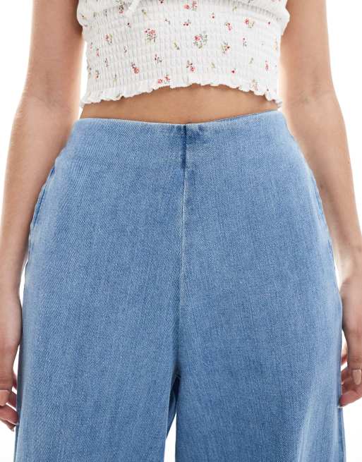 ASOS DESIGN soft wide leg jeans with clean front in midwash blue