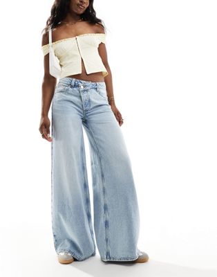 Asos Design Soft Wide Leg Jeans With Cross Front In Light Wash Blue