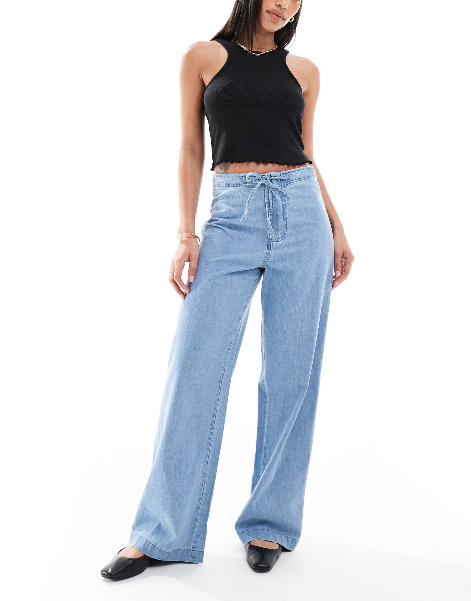 asos design soft wide leg jeans with tie waist in mid blue