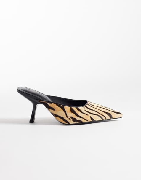 ASOS DESIGN Sophie premium hair on real leather mid heeled mules in tiger print - view 1