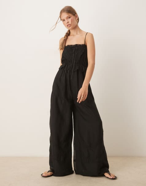 ASOS DESIGN - Sort cami-jumpsuit med bånddetalje og broderier - view 1