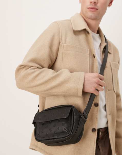 ASOS DESIGN - Sort crossbody-taske med prægede detaljer i imiteret læder - view 1