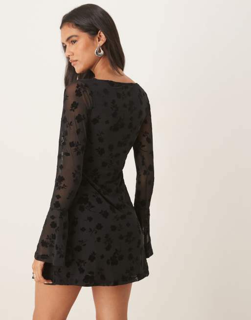 ASOS DESIGN flute sleeve floral flocked mesh mini dress in black