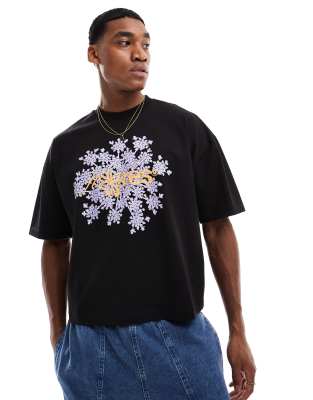 ASOS DESIGN - Sort og oversized T-shirt med firkantet pasform og blomstergrafik