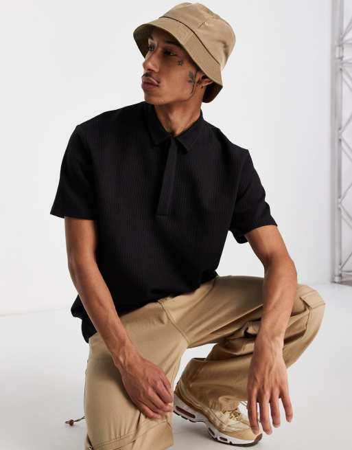 ASOS DESIGN - Sort, oversized polo i let vaffeltekstur