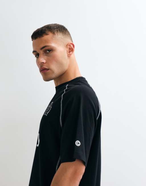 ASOS DESIGN - Sort oversized T-shirt med cut-and-sew-design og fodboldgrafik, 2 af 5