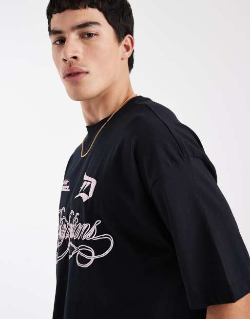 ASOS DESIGN - Sort oversized T-shirt med grafisk fodboldprint, 4 af 5