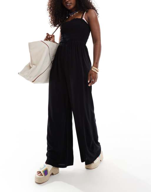ASOS DESIGN - Sort strand-jumpsuit med bandeau-snit og rynker