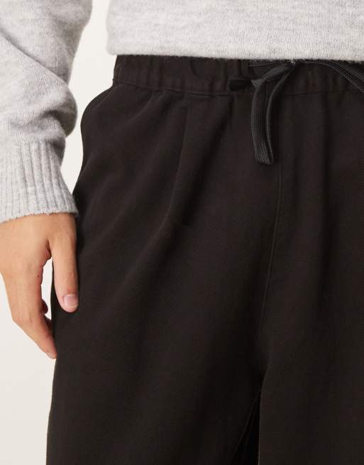 ASOS DESIGN - Sorte afslappede pull-on-bukser i tapered pasform, 4 af 5