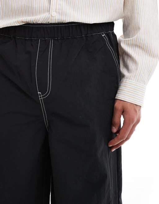 ASOS DESIGN - Sorte baggy bukser i nylon med syninger i kontrastfarve, 5 af 5