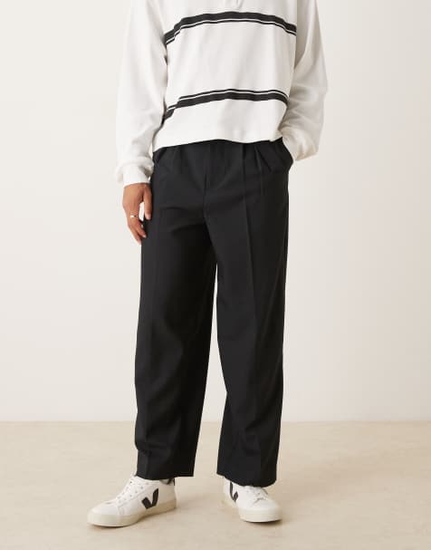 ASOS DESIGN - Sorte elegante bukser med vidde og bælte samt plisseringer foran - view 1