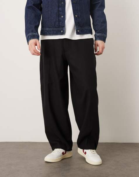 ASOS DESIGN - Sorte elegante bukser med vide tøndeformede ben og plisseringer i uldblanding - view 1