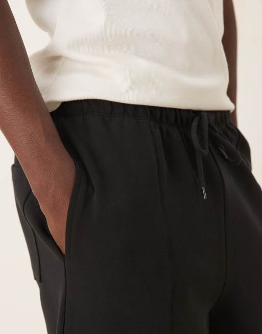 ASOS DESIGN - Sorte joggingbukser i dobbeltsidet stof med indsnævrede ben og pintucks, 2 af 5