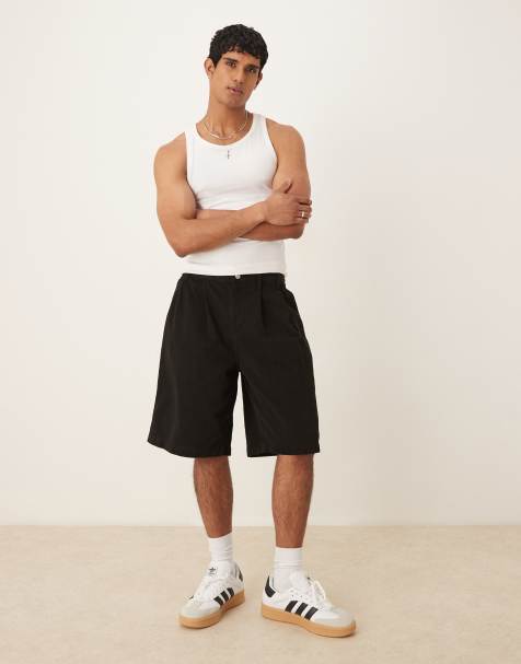 ASOS DESIGN - Sorte jorts med dobbelte plisseringer i længere længde - view 1