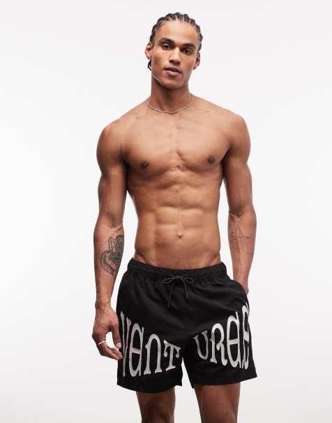 ASOS DESIGN - Sorte mellemlange badeshorts med print - view 1
