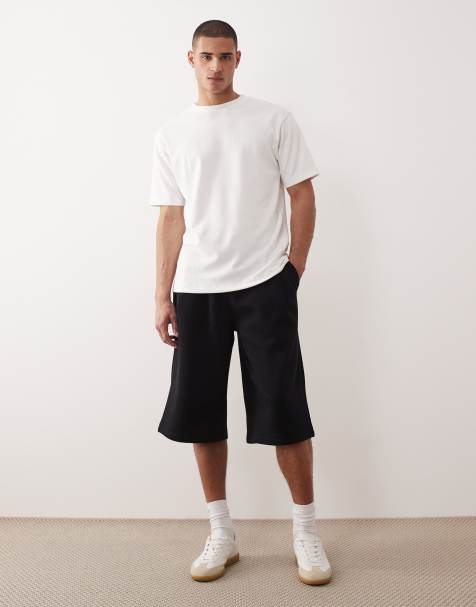 ASOS DESIGN - Sorte oversized longline-jerseyshorts med plisseringer - view 1