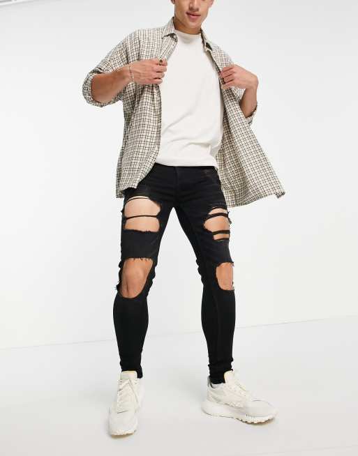 ASOS DESIGN - Sorte spray on-jeans med power stretch og store flænger