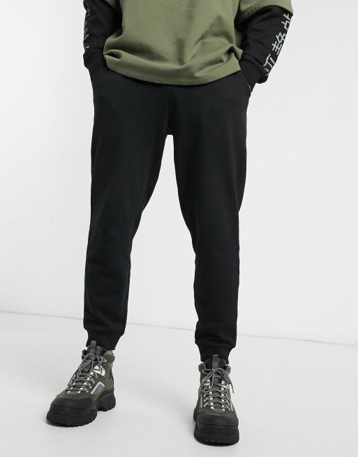 ASOS DESIGN - Sorte tapered joggingbukser - BLACK